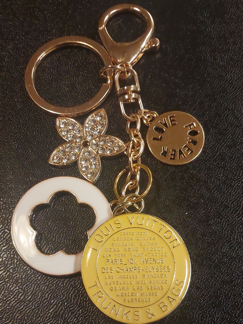 LV Gold-tone, White Clover & Yellow Trunks & Bags Charm Keychain.